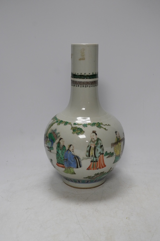 A Chinese famille verte bottle vases, Kangxi mark but later, 25.5cm. Condition - good.